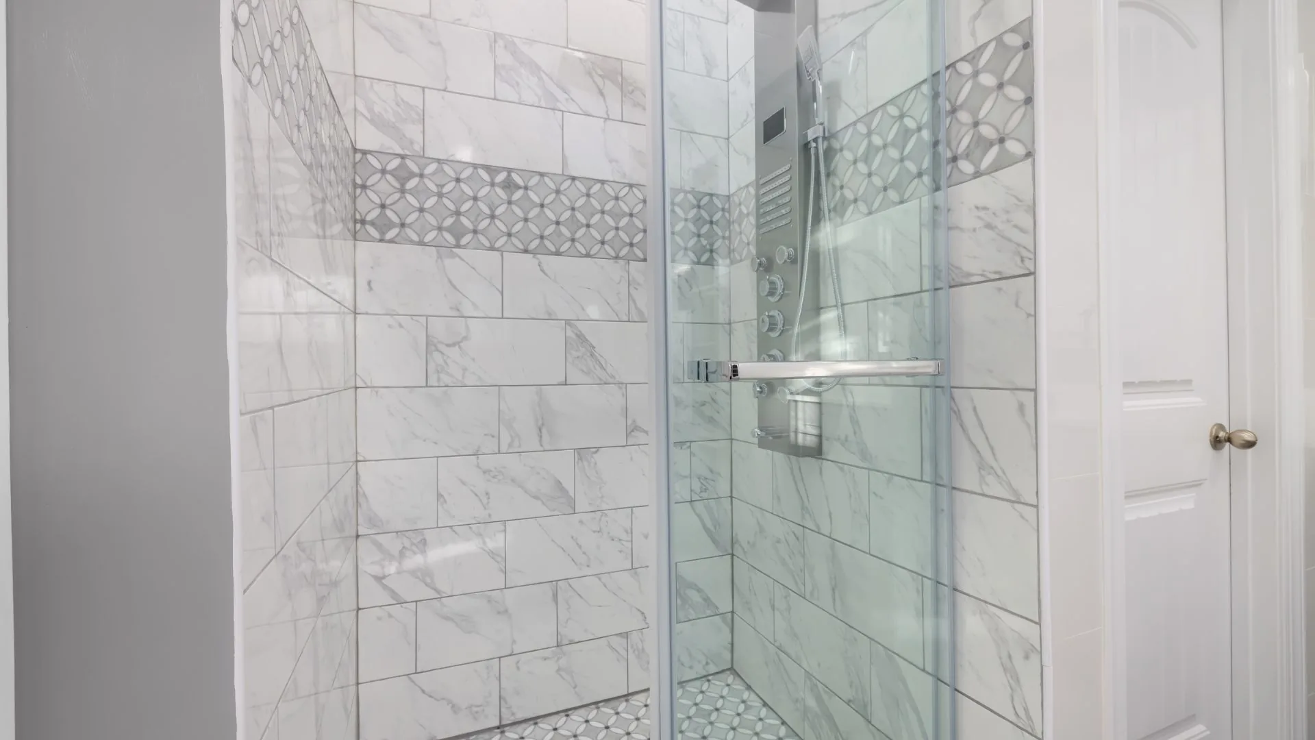 Sliding shower door repair with marble tile